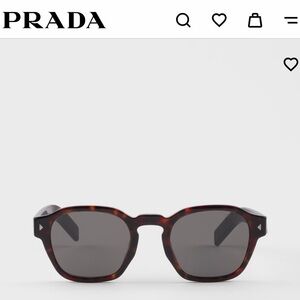 Prada Sunglasses with the iconic metal plaque